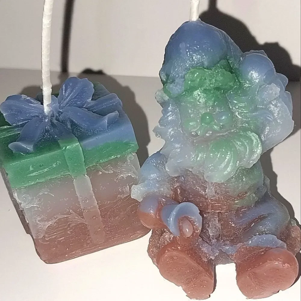 Hand crafted 2 piece holiday Santa's present candle set